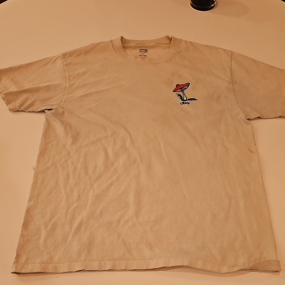 Obey Tan Graphic Tee with Red Mushroom Design